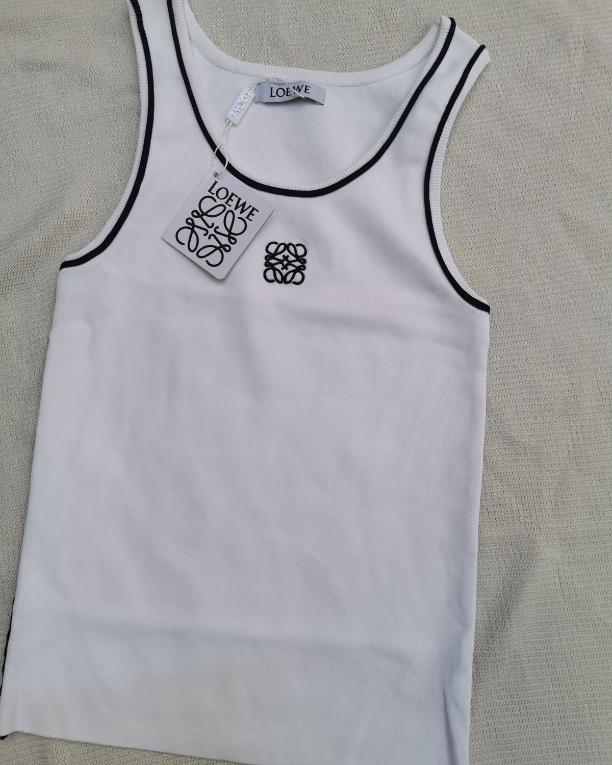 Petit haut loewe dispo en marron blanc et noir